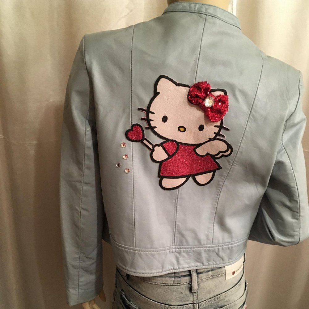 ADORABLE robins egg blue genuine leather jacket jacket with hello kitty details!